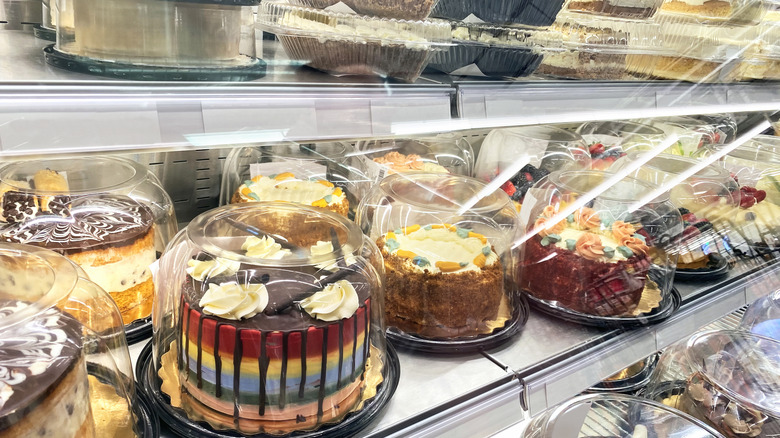 Cakes in a case in a grocery store