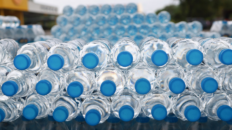 Rows of bottled water stacked up