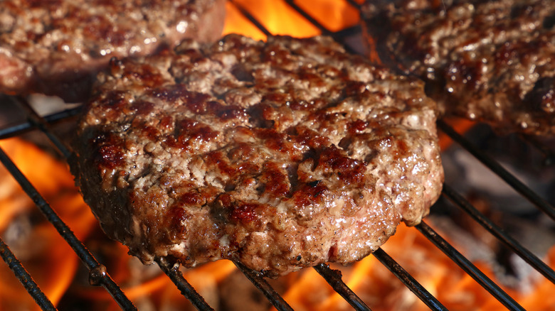 burger patties on a grill