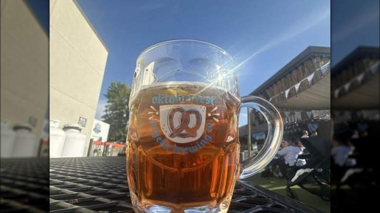 A mug of Oktoberfest beer on an outdoor table, day