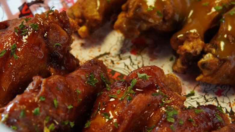 Super saucy wings with garnishes
