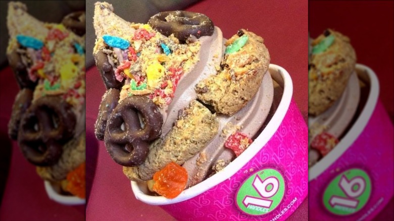 upclose shot of froyo with tons of candy and cookie toppings