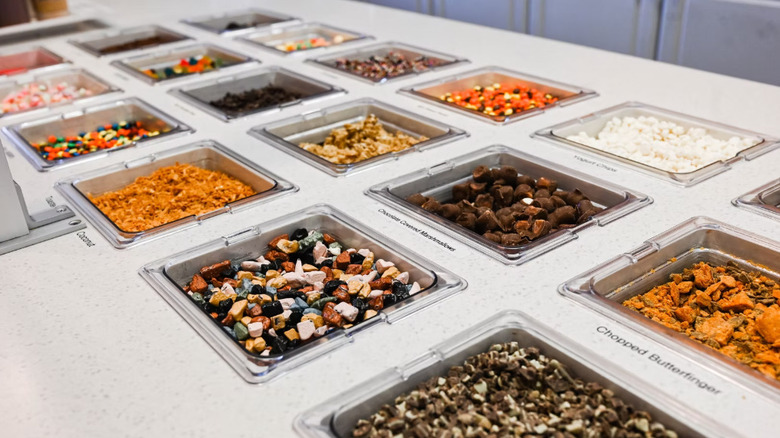 toppings bar at a froyo shop