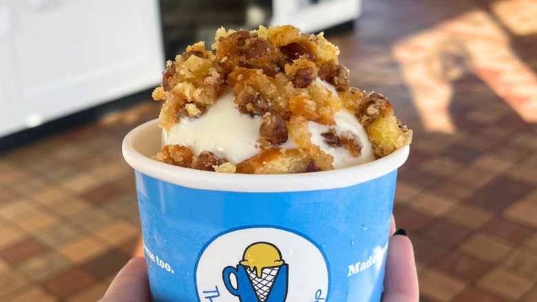 The Golden Scoop Ice Cream cup with toppings