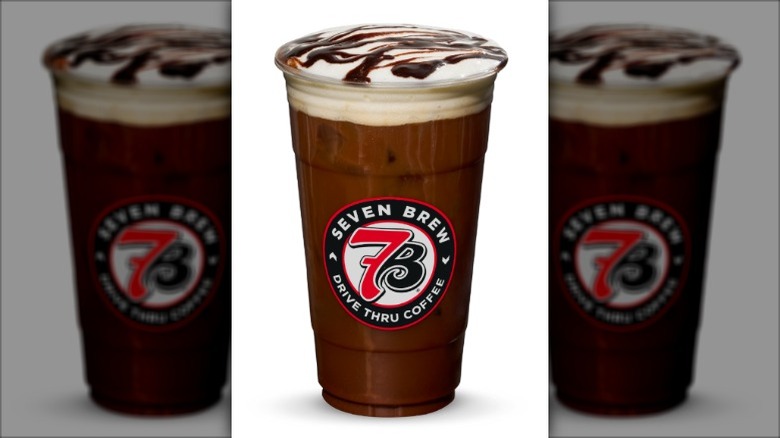 7Brew Banana Bread Cold Brew in a large plastic cup bearing a 7Brew logo on a white background.