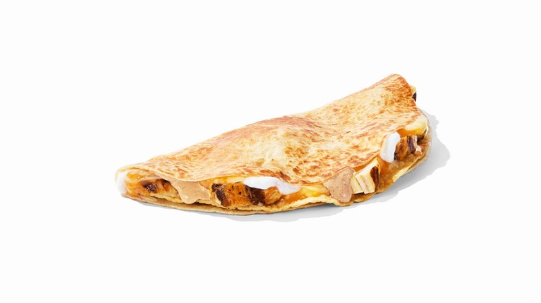 The Crunchadilla at Taco Bell on a white background.