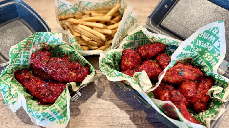 Sour Patch Kids Wicked Punch-flavored chicken tenders, boneless, and bone-in wings from Wingstop