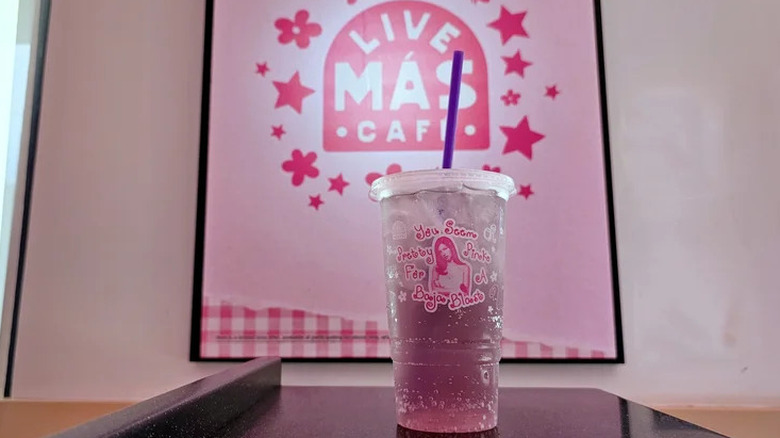 Olivia Rodrigo's You Seem Pretty Pink for a Baja Blast drink inside a Live Más Café