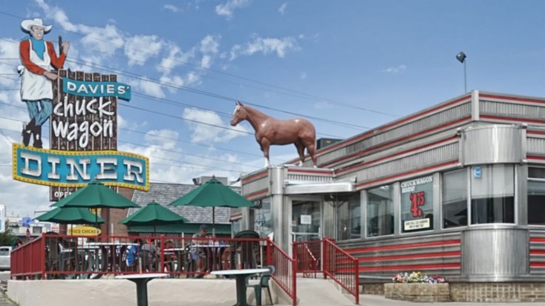 Exterior of Davie's Chuck Wagon Diner showing Western logo sign and iconic horse statue