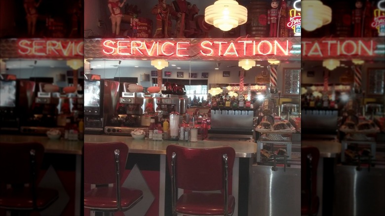 Interior dining area with counter seating at Nutcracker Family Restaurant