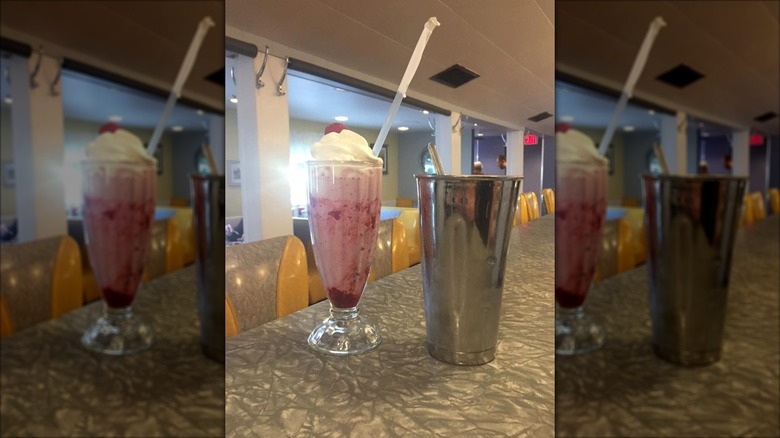 Classic old fashioned milkshake sitting on counter at Henry's Diner