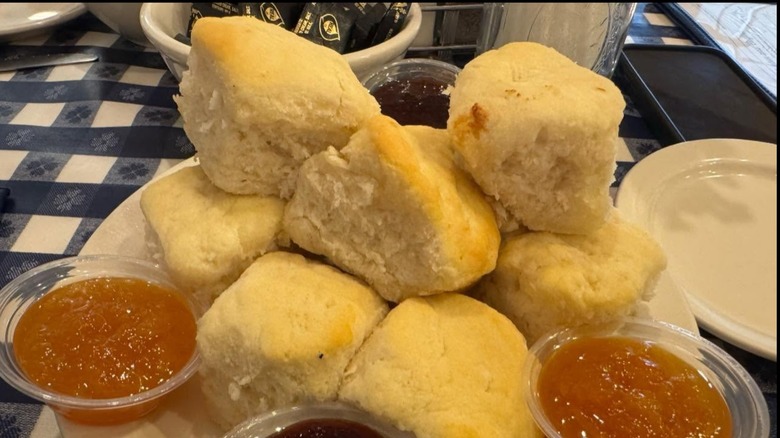 Heaping plateful of biscuits with sides of jam at Loveless Cafe