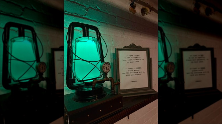 Secret green light entrance at Swordfish Tom's