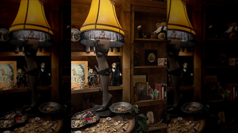 Unique vintage interior featuring a table with a vintage lamp at Prohibition