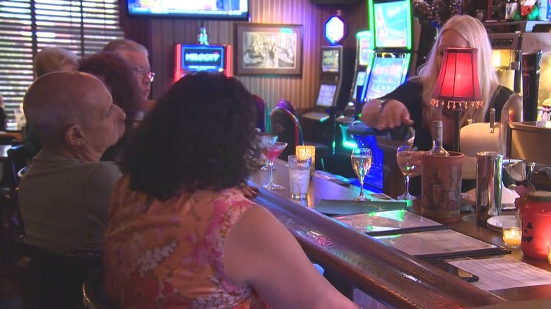 People sitting at the bar in The Great Escape.