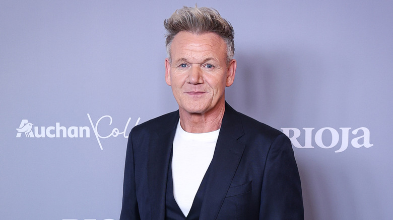 Gordon Ramsay posing on a red carpet