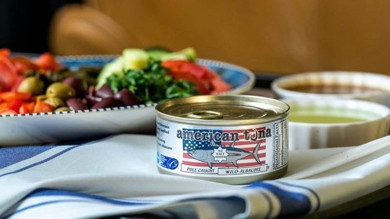 Can of American Tuna in front of salad