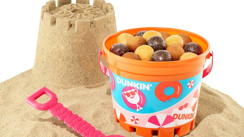 Dunkin's MUNCHKINS beach bucket in sand