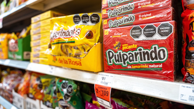 A selection of modern Mexican candy on shelves at a store