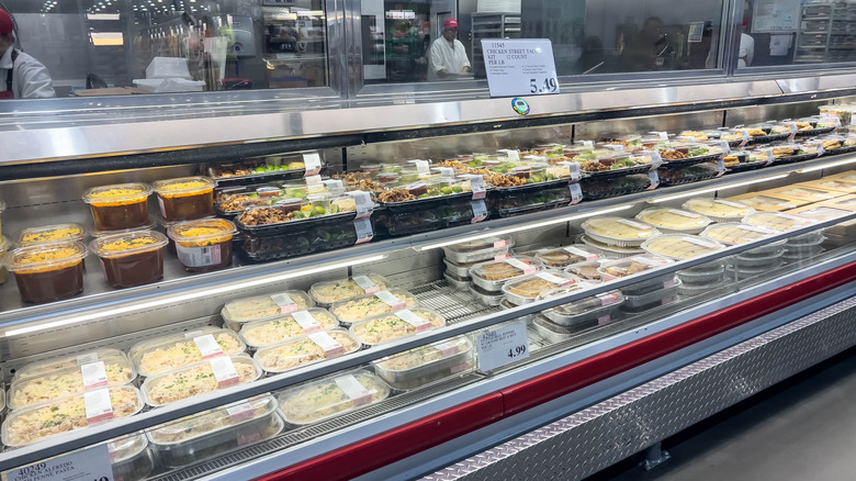 Costco deli display with premade meals ready to eat.