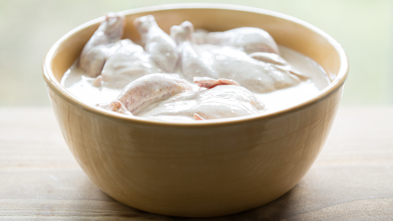 chicken marinating in buttermilk