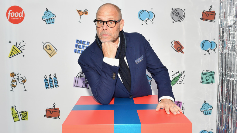 Alton Brown posing with chin on fist