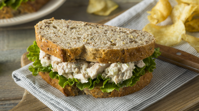 Chicken salad sandwich with lettuce on wheat bread