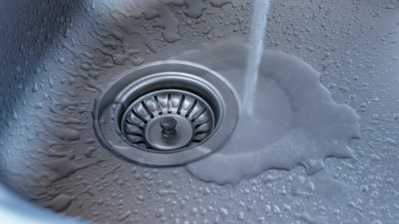 Water running in a kitchen sink