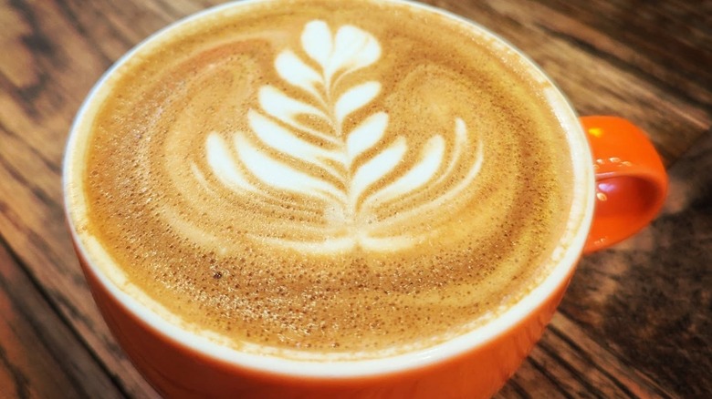 Latte with latte art from Dark Matter Coffee