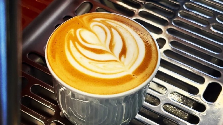 Latte with latte art from Archetype Coffee