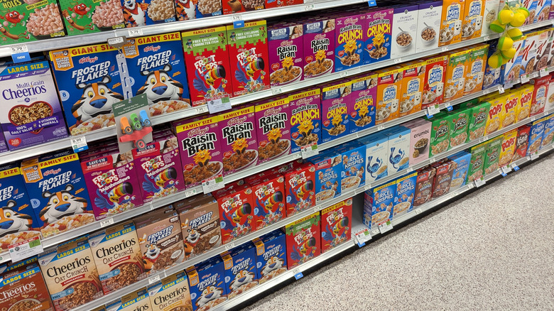 Colorful boxes of cereal displayed in a grocery store