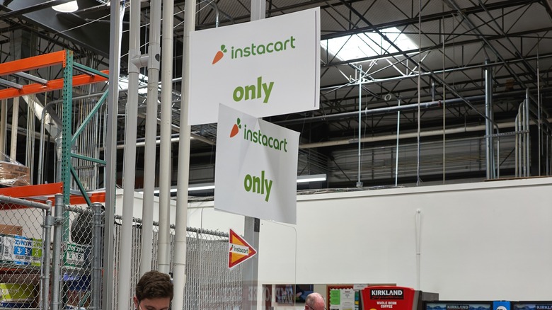 Instacart signs inside a Costco warehouse
