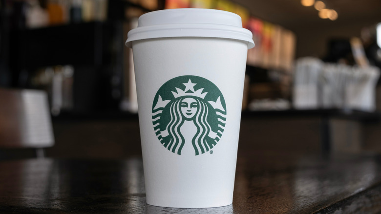 To-go cup of Starbucks coffee