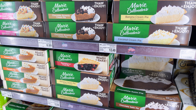 Assortment of Marie Callender's frozen pies in grocery store freezer section