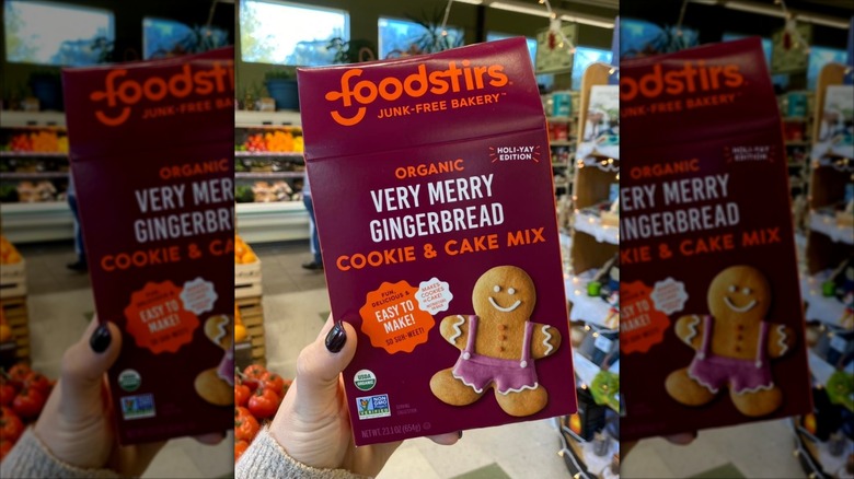hand holding a box of Foodstirs cookie mix