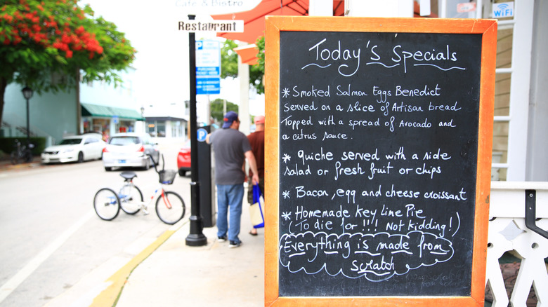 Restaurant chalk board with Today's Specials listed outside