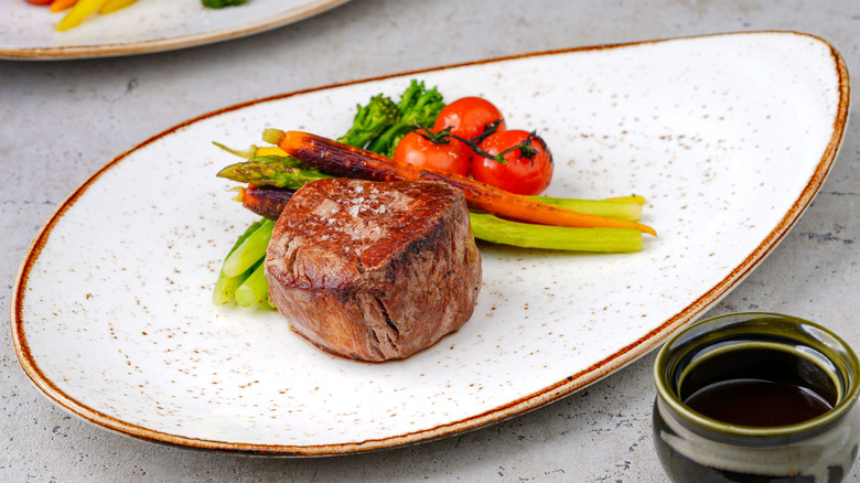 Filet mignon and seared vegetables