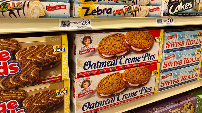 Boxes of Little Debbie snacks on store shelf