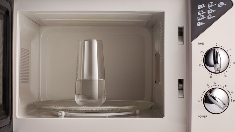 Glass of water in microwave