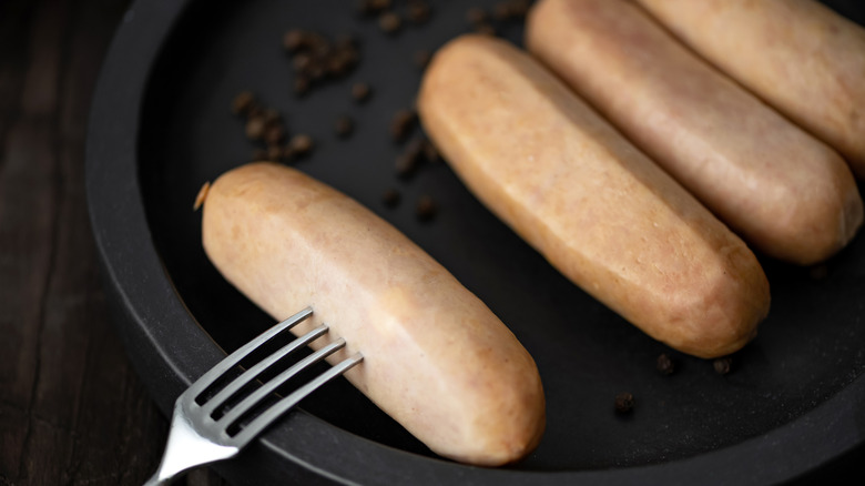 Fork pricking sausage casing