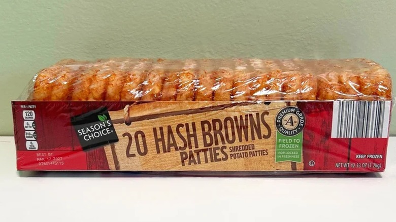 A package of Aldi Season's Choice hash brown patties on counter.