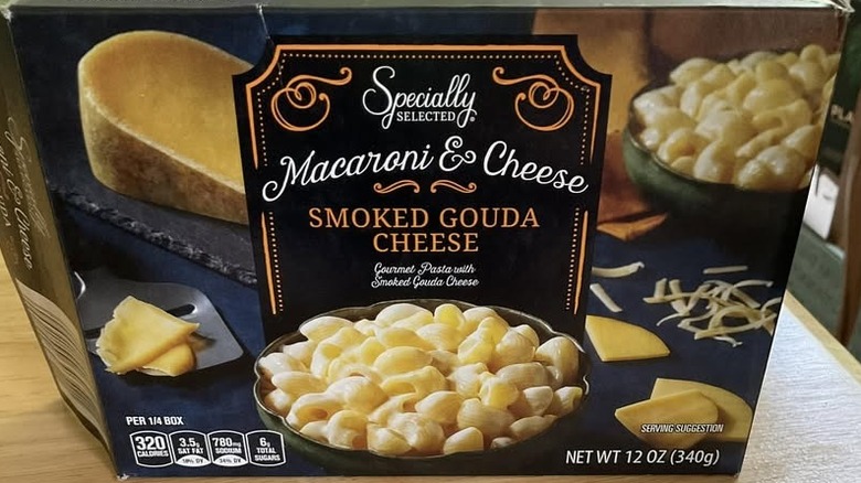 An open box of Aldi's Specially Selected Smoked Gouda Macaroni & Cheese on kitchen counter