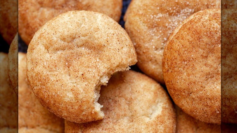 Close-up of snickerdoodle cookies with one bite taken out