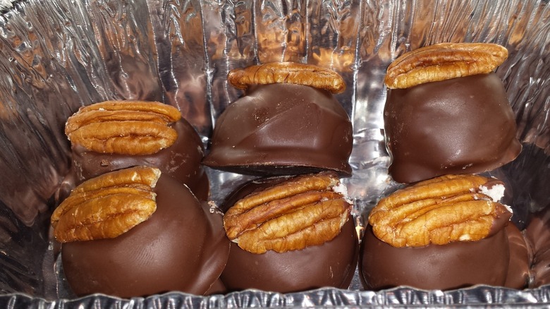 Bourbon balls topped with pecans