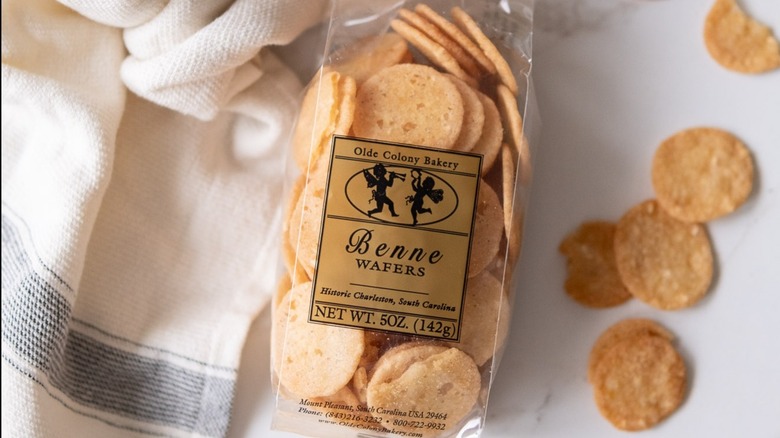 Package of benne wafers with a few loose ones alongside