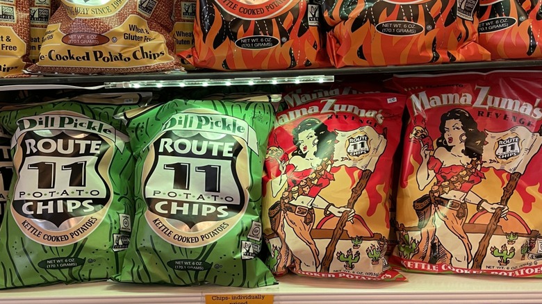 Shelf filled with assorted Route 11 Potato Chips
