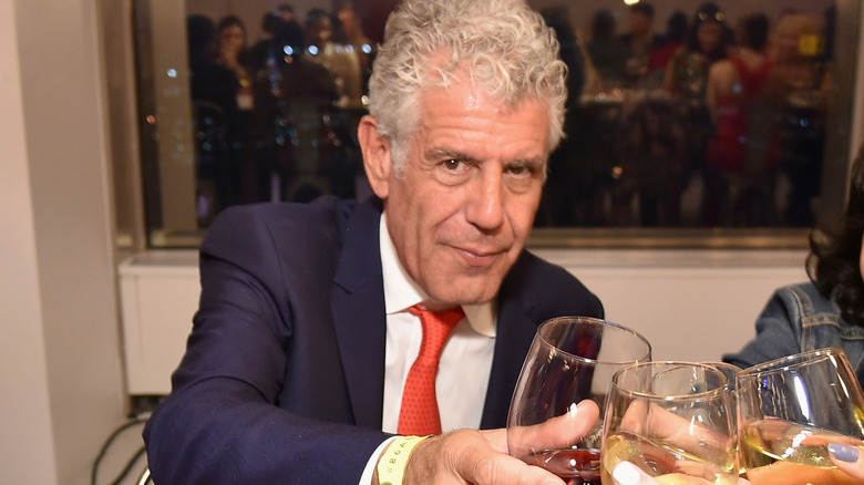 Anthony Bourdain at dinner table