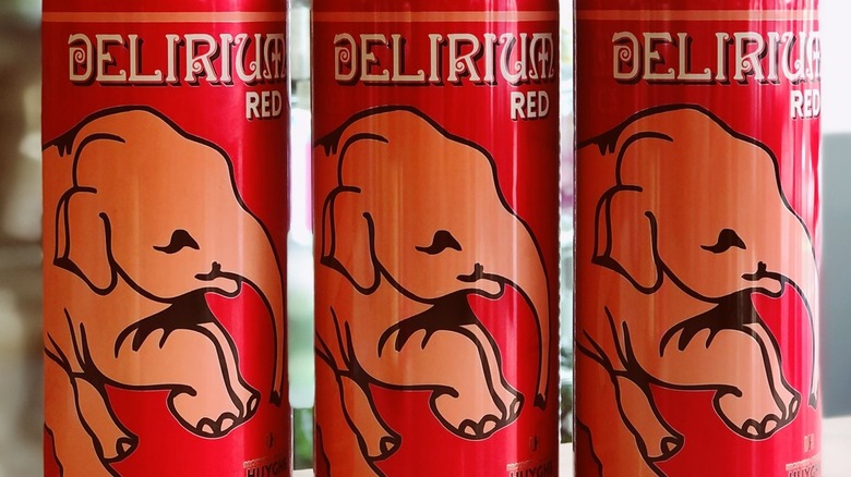 Three cans of Delirium Red