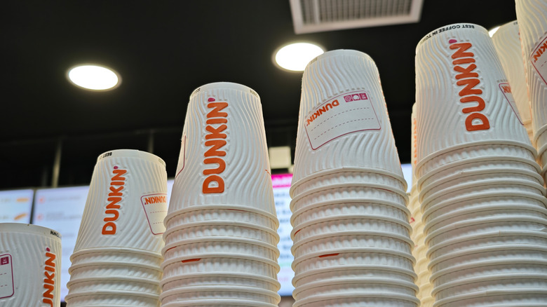 Stacks of Dunkin' Donut paper cups