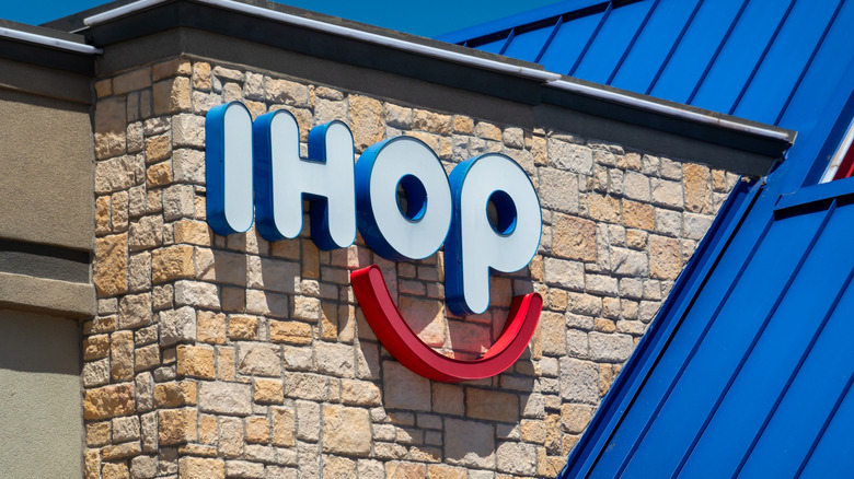 IHOP logo on brick building exterior
